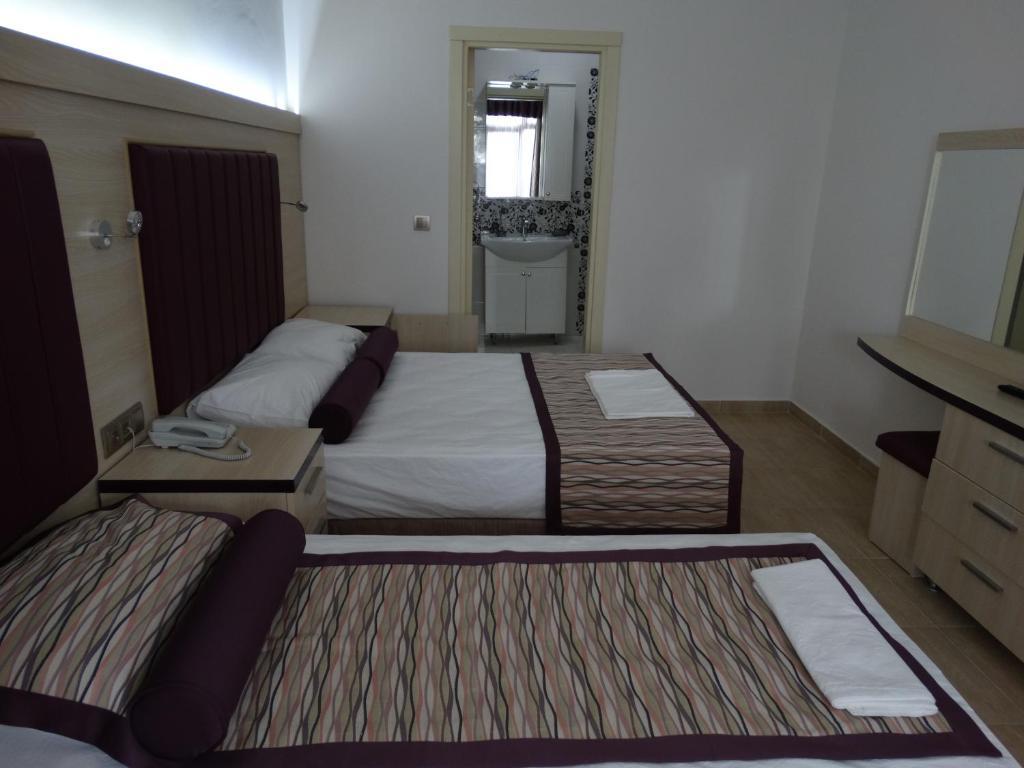 Bronze Hotel Gümbet Quarto foto